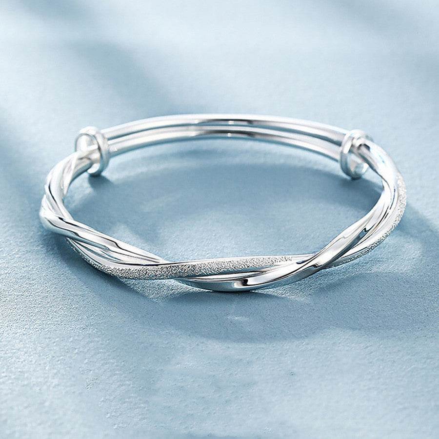 Buycenter Silver-Plated Bracelet - Twist Design with Floral Elements - Buy Center