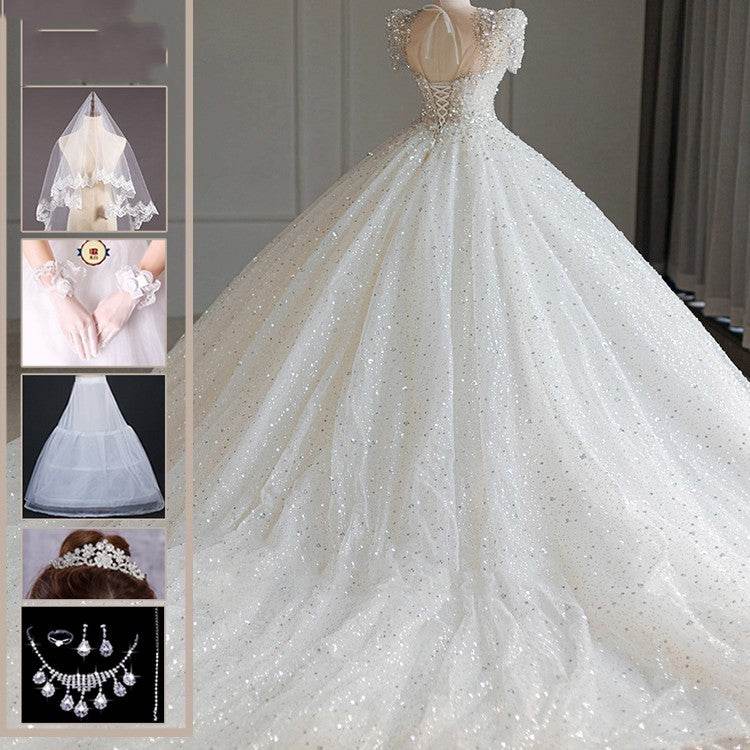 Stunning Bridal Dress with Large Trailing Tail - Stylish 2025 Wedding Gown - Buy Center