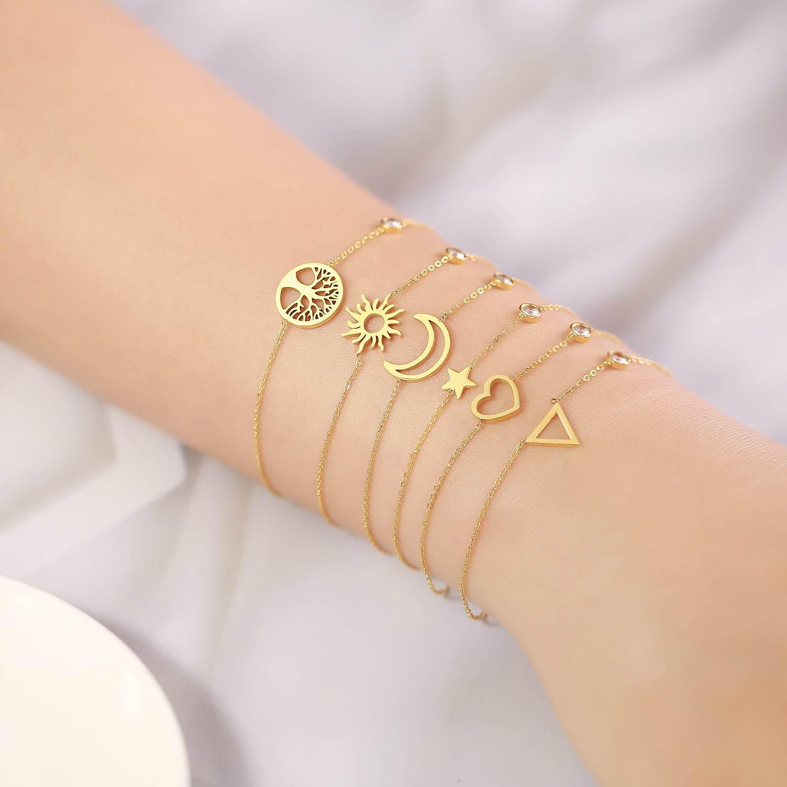 Buy Center Stainless Steel Thin Bracelet - Sun, Moon & Star Design - Buy Center
