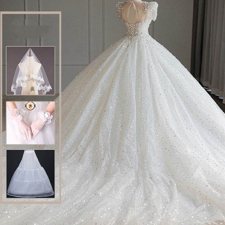 Stunning Bridal Dress with Large Trailing Tail - Stylish 2025 Wedding Gown - Buy Center